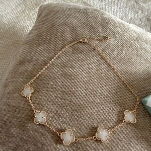 Elegant Gold and White Clover Necklace